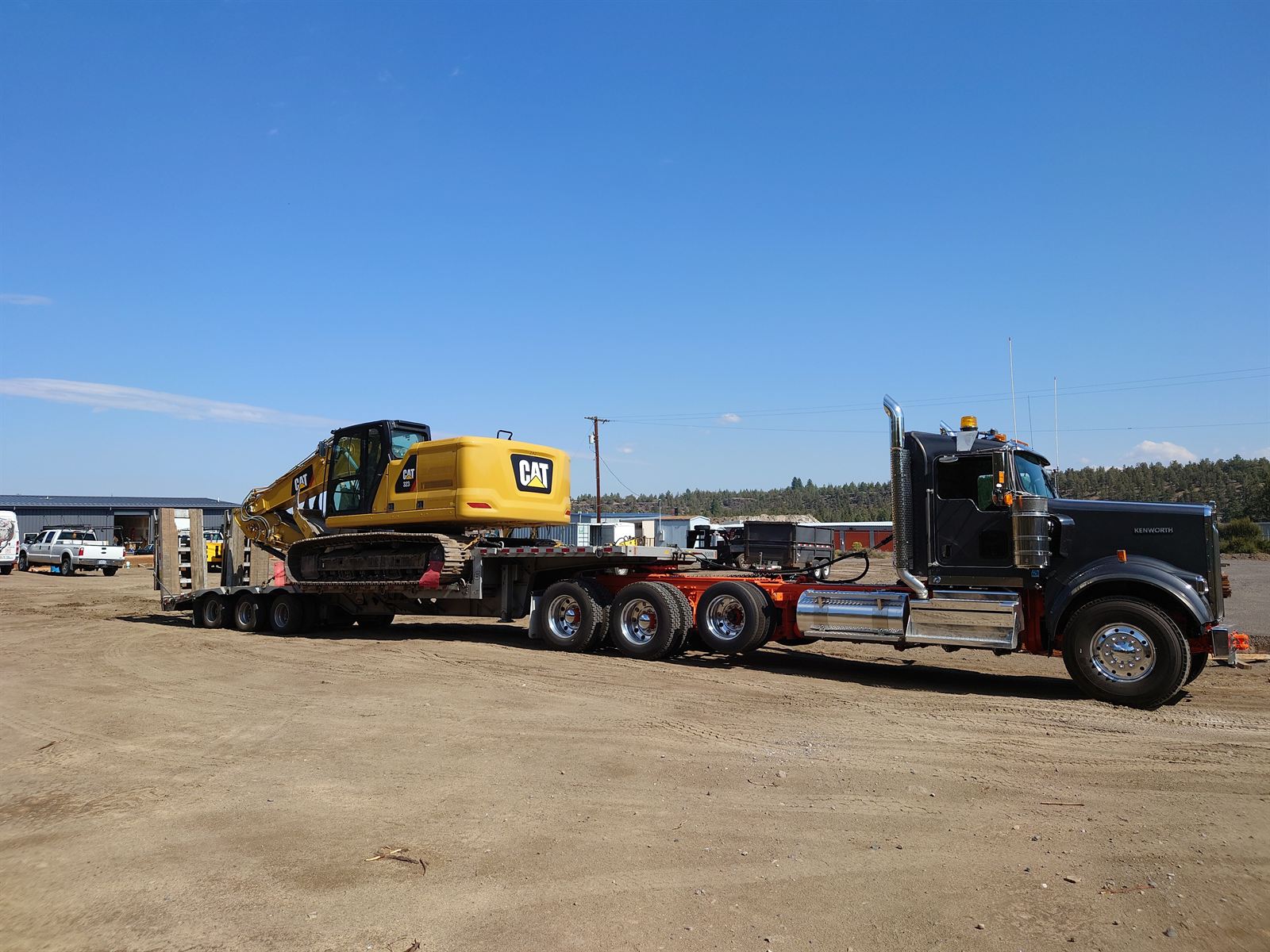 Tumalo Transport truck and trailer working in Central Oregon